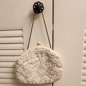 Elegant Cream Beaded Clutch